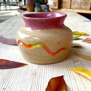 Colorful stoneware vase with wavy pattern